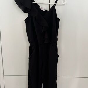Parker sleeveless jumpsuit with ruffle. Perfect for comfy or going out!